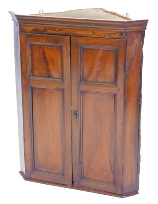 Lot 1188 - A 19thC fruitwood corner cabinet, with a later...
