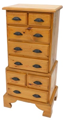 Lot 1140 - A narrow pine cabinet, the top with a moulded...