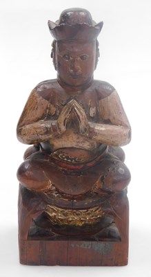 Lot 21 - A Qing dynasty carved and painted wooden...