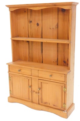 Lot 1181 - A miniature replica pine dresser, the back...