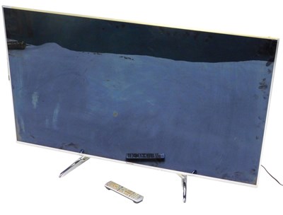 Lot 1135 - A Panasonic 58" flat screen television, with...