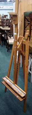 Lot 1664 - An artist's easel, in pine, 180cm high, 63cm...
