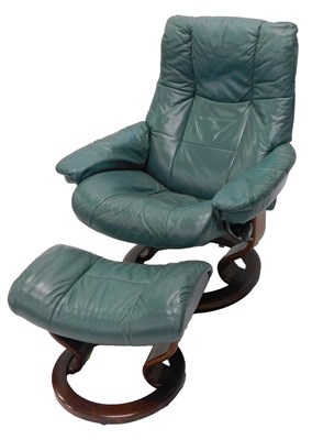 Lot 1207 - A Stressless green leather adjustable armchair,...