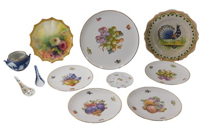 Lot 888 - An Aynsley plate, painted with flowers, on a...