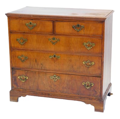 Lot 1212 - An 18thC walnut chest of drawers, the top with...