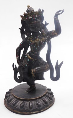 Lot 68 - A 20thC Tibetan bronze and jewelled figure of...