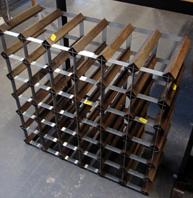 Lot 1549A - A wood and steel wine rack.