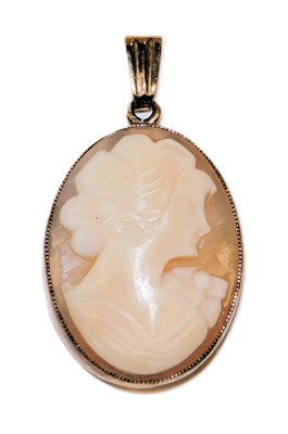Lot 216 - A 9ct gold and shell cameo pendant, bust...