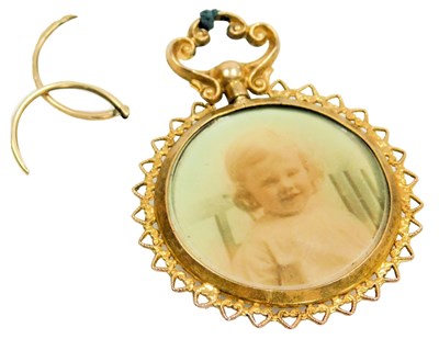 Lot 208 - A 9ct gold double sided photo locket, together...