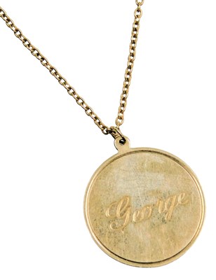 Lot 203 - A 9ct gold circular pendant, engraved Love...
