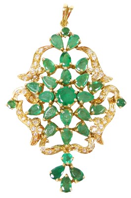Lot 4 - An emerald and diamond pendant, of floral form,...