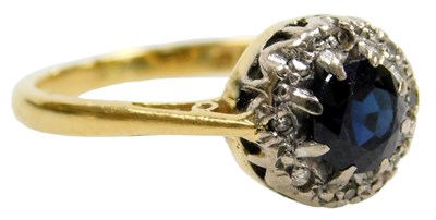 Lot 202 - An 18ct gold sapphire and diamond ring, the...