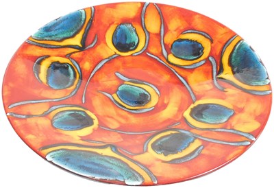 Lot 60 - A Poole pottery Peacock pattern charger,...