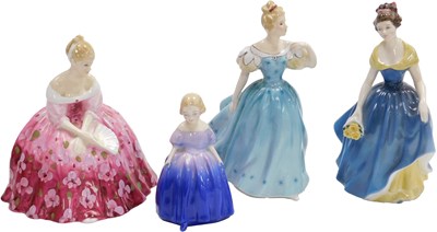 Lot 61 - Four Royal Doulton figures, comprising Melanie...