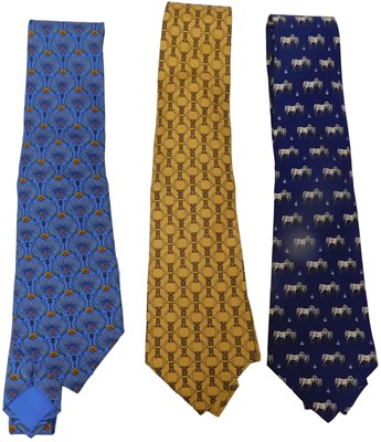 Lot 274 - Three Hermes silk ties, comprising a pale blue...