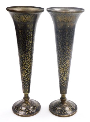 Lot 91 - A pair of early 20thC Indian brass and niello...