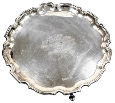 Lot 104 - An Elizabeth II silver piecrust salver,...