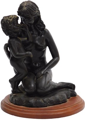 Lot 133 - A bronzed figure group of a kneeling naked...