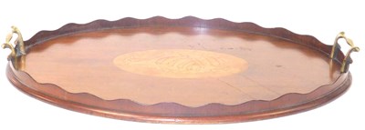 Lot 142 - An Edwardian mahogany and brass twin handled...