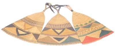 Lot 150 - Three Nigerian Calabar Rafia fans, 38-39cm high.