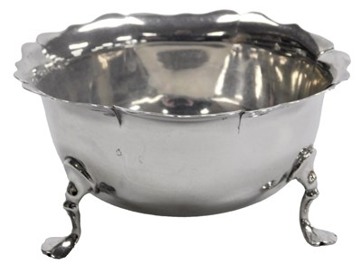 Lot 312 - A Victorian silver sugar bowl, raised on three...