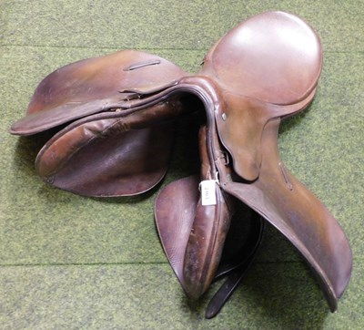 Lot 2163 - A tan leather saddle, 62cm deep.