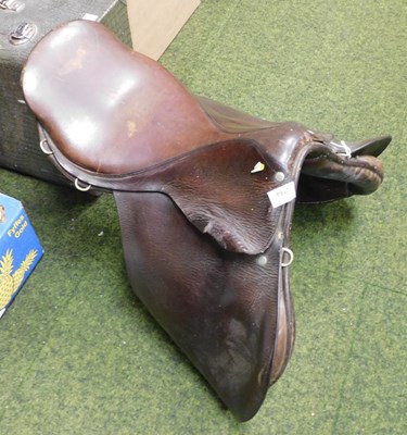 Lot 2164 - A tan leather saddle, 55cm deep.