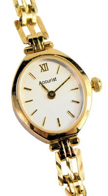Lot 229 - An Accurist 9ct gold lady's wristwatch, the...