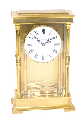 Lot 358 - A Rapport brass cased mantel clock, circular...