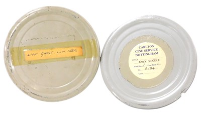 Lot 362 - Two cine films, boxed, marked as Laurel-Hardy...