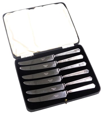Lot 514 - A set of six George VI silver handled cake...