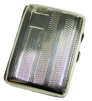Lot 521 - A George V silver cigarette case, with engine...