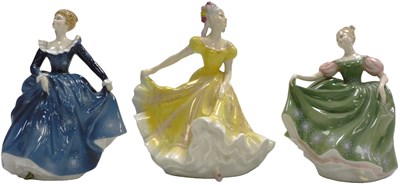 Lot 378 - Three Royal Doulton figures, modelled as...
