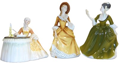 Lot 392 - Three Royal Doulton figures, comprising...
