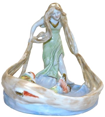 Lot 395 - A German porcelain figure, Art Nouveau style,...