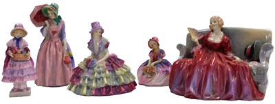 Lot 398 - Five Royal Doulton figures, comprising Miss...