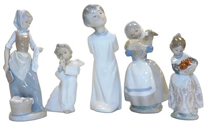 Lot 399 - Two Lladro porcelain figures, modelled as a...