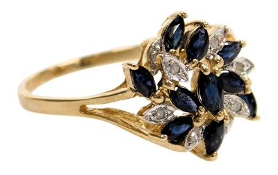Lot 405 - A 9ct gold sapphire and diamond floral cluster...