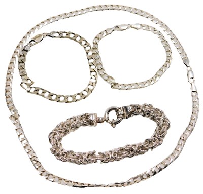 Lot 412 - A silver fancy link bracelet, on a bolt ring...