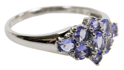Lot 420 - A 9ct white gold and pale amethyst set floral...