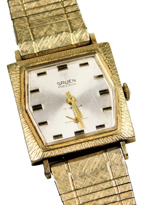 Lot 421 - A Gruen lady's wristwatch, silvered dial, with...