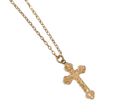 Lot 51 - A cross pendant and chain, the cross bright...
