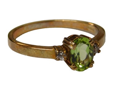 Lot 59 - A Gems TV 9ct gold and peridot ring, the...