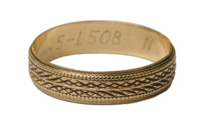 Lot 64 - A 9ct gold wedding band, with engraved...