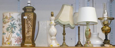 Lot 2084 - A group of table lamps, to include a green...