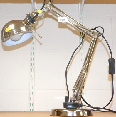 Lot 2091 - A steel Anglepoise type lamp.