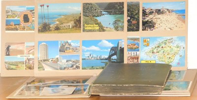 Lot 2097 - A 20thC and later postcard album, depicting...