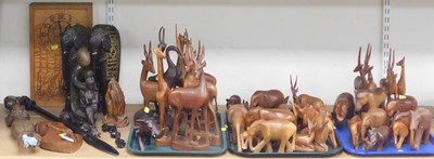 Lot 2114 - A group of carved hardwood African animals, to...