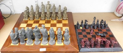 Lot 2117 - Two chess sets, with wooden boards, one of...