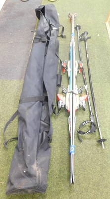 Lot 2126 - A pair of skis with poles.